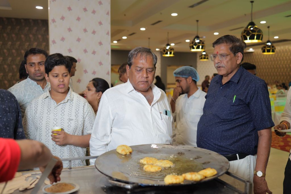Premium buffet spread at a housewarming party in Noida by Mithila Events