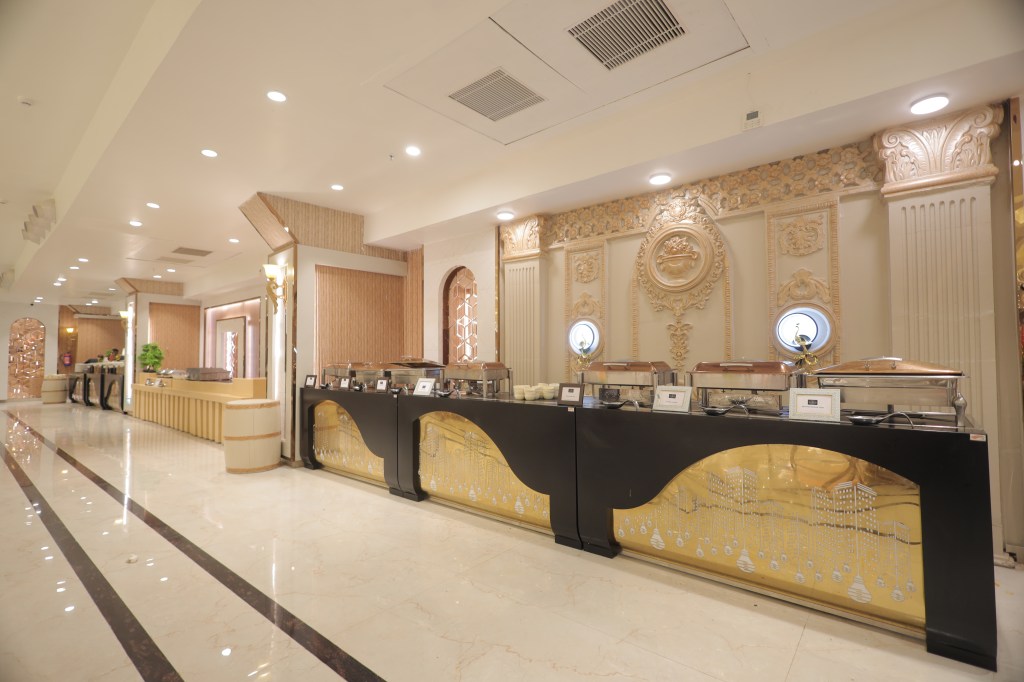 Banquet hall buffet counters set up for a first birthday party in Noida by Mithila Events