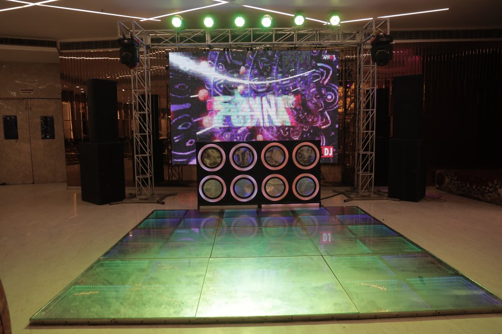 LED dance floor and DJ setup at a corporate evening in Noida