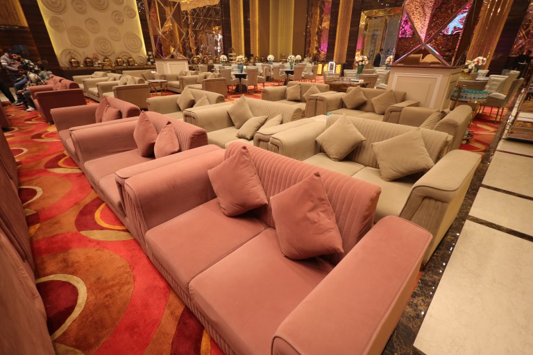 Lounge sofa seating for guests at a cocktail evening in Noida