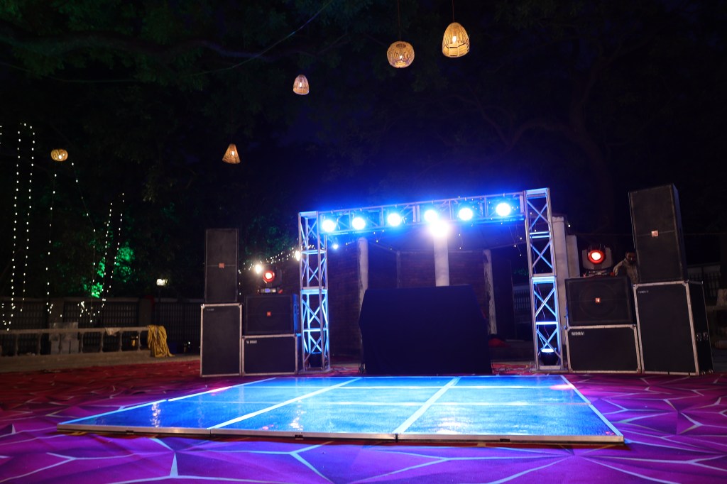 Truss lighting and stage setup at an outdoor event in Noida by Mithila Events