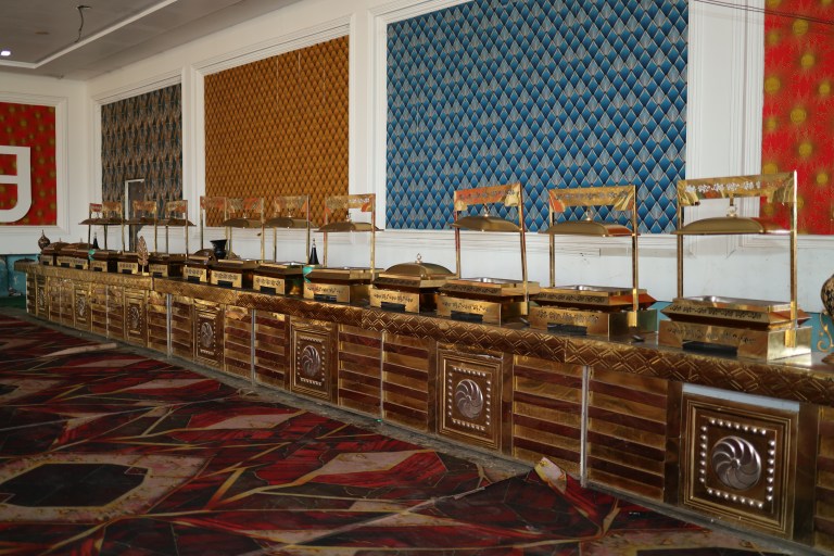 Bar counter set up in a banquet hall for a party in Noida