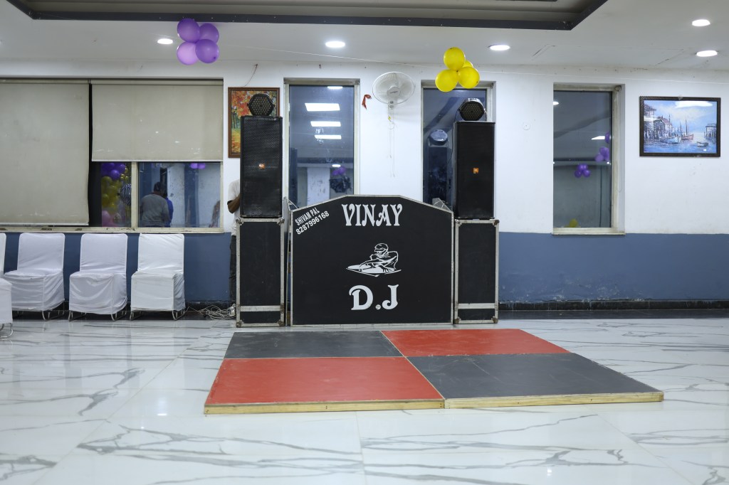DJ console set up in a banquet hall for a birthday party organised by Mithila Events