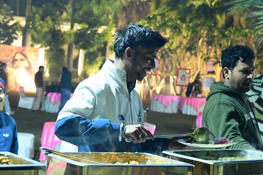Mithila Events catering staff serving guests at a wedding buffet in Noida