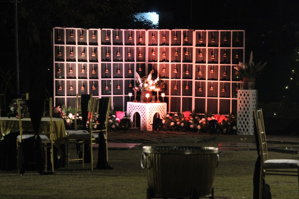 Evening farmhouse wedding setup with lighting, Mithila Events, Noida